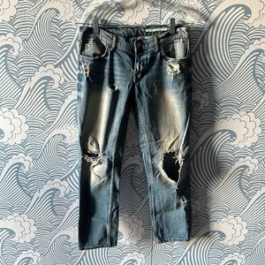 Zara woman medium rise slim fit with holes. Size 4 jeans